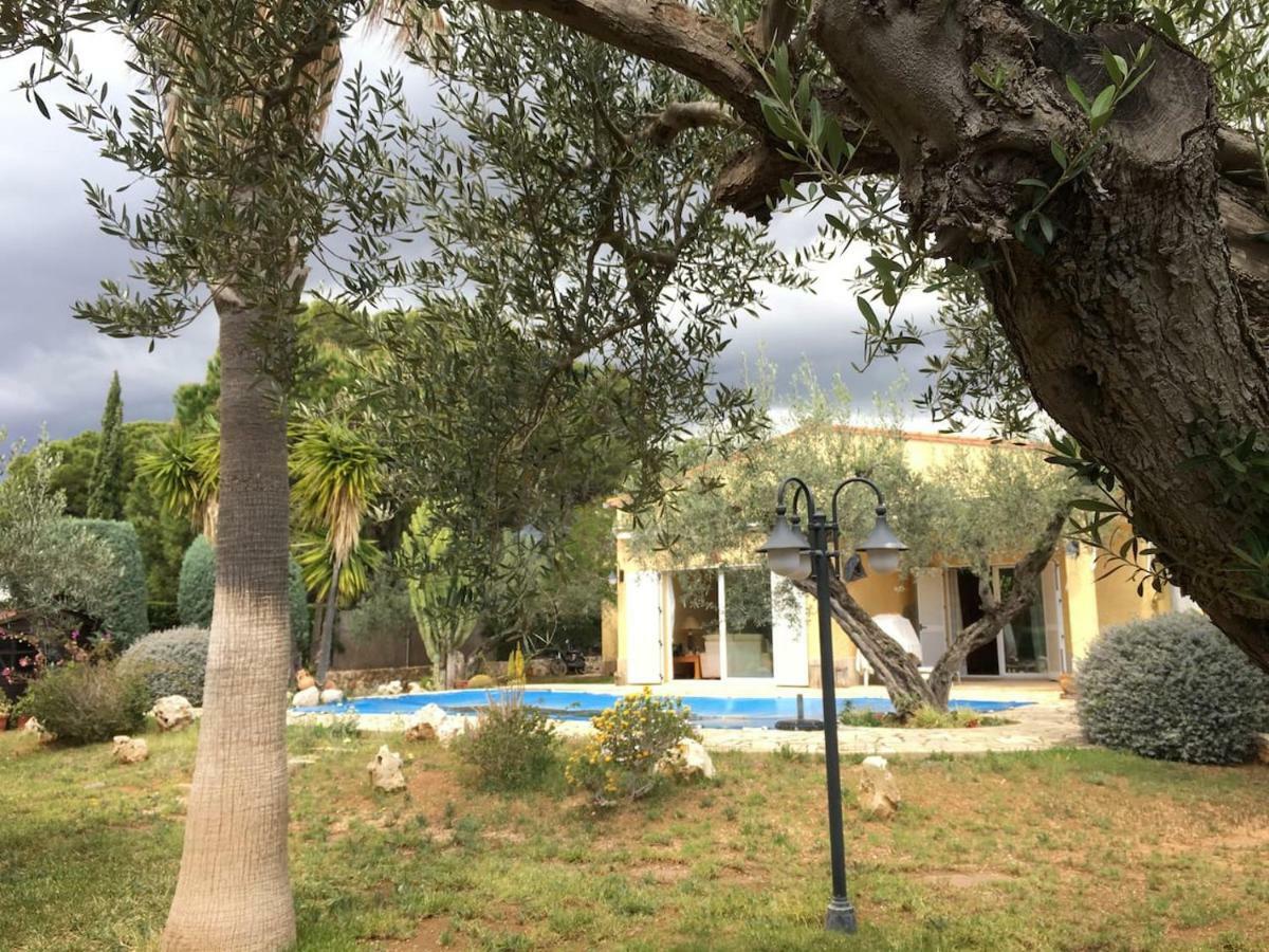 La Inopia Villa L'Ampolla Bagian luar foto